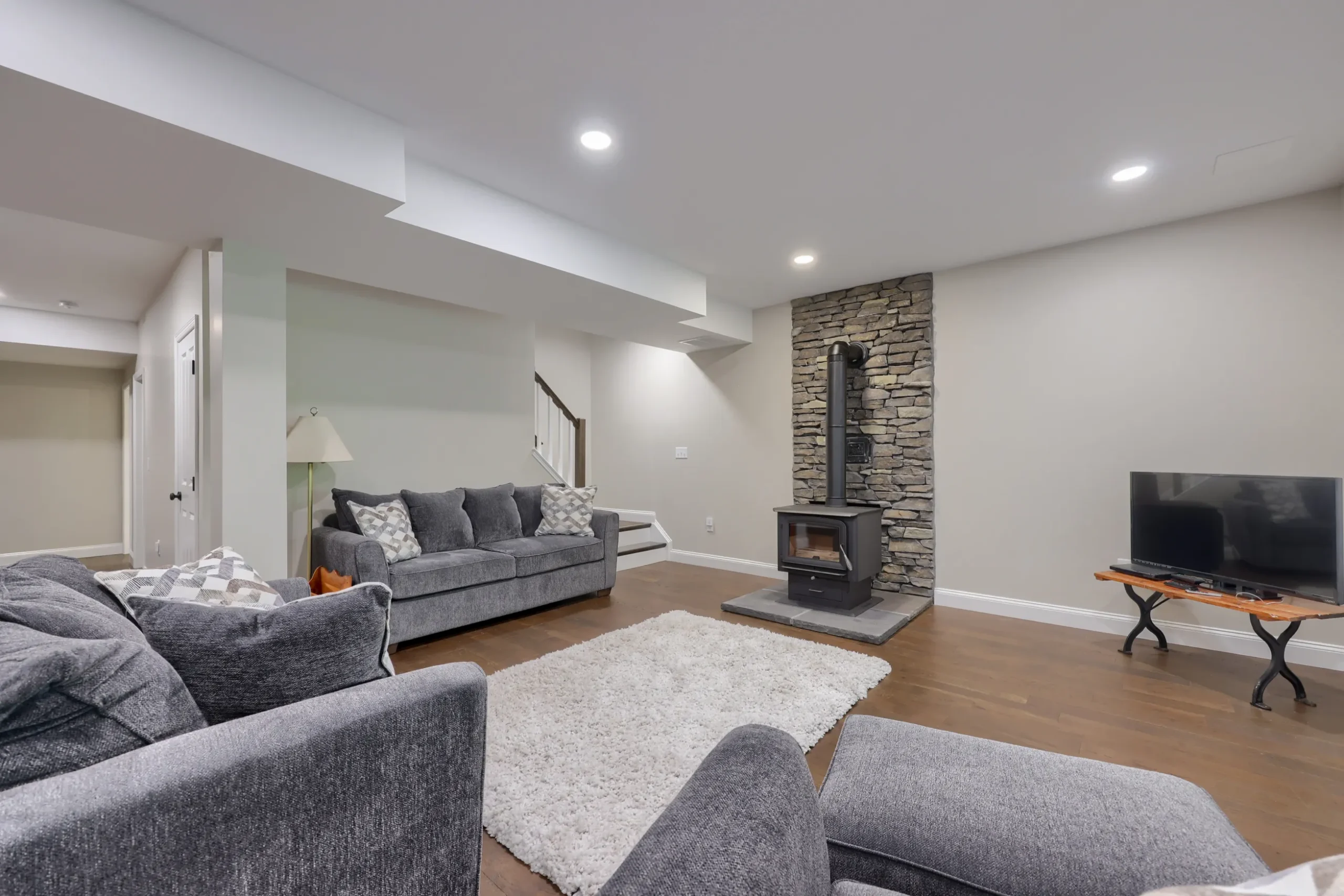 A finished basement remodel by ISM Construction converting an unfinished space into a bright, functional living area for a Lebanon County homeowner.