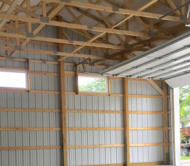 An ISM Construction post-frame building featuring durable exterior materials and a versatile layout designed for garages, workshops, or agricultural use.