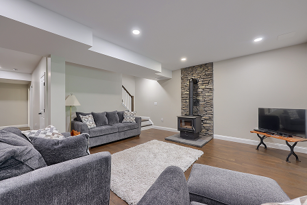 A finished basement remodel by ISM Construction on Netzley Drive converting an underutilized lower level into a functional and inviting living space.