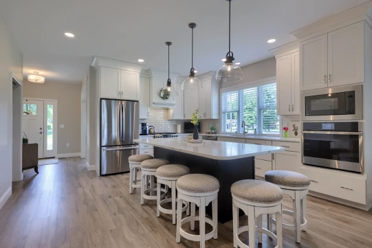 A fully functional kitchenette built by ISM Construction inside an in-law suite, designed to support independent living for aging parents or long-term guests.