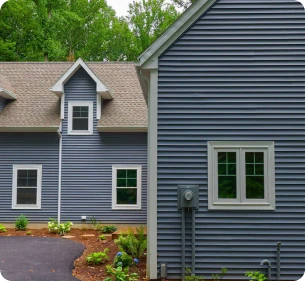 A beautifully remodeled home exterior by ISM Construction in Lebanon, PA showcasing upgraded siding, trim, and curb appeal enhancements.