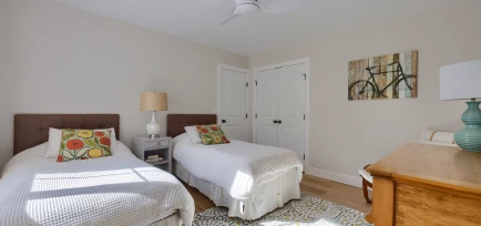 Bright children's bedroom with twin beds completed by ISM Construction, experts in Second-Story Additions in Lebanon, PA.