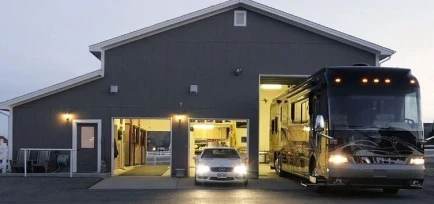 An expansive, detached commercial-grade garage featuring high-clearance bays for large RVs and boats, completed by ISM Construction as part of their Custom Garages in Lebanon, PA services.