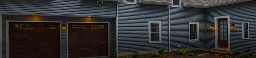 A custom garage, pole building, and second-story addition built by ISM Construction for work, storage, and expanded living.