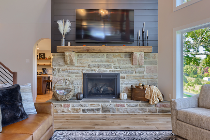 A custom built-in cabinetry and fireplace surround designed and built by ISM Construction, adding character and a stunning focal point to a Lebanon County home.
