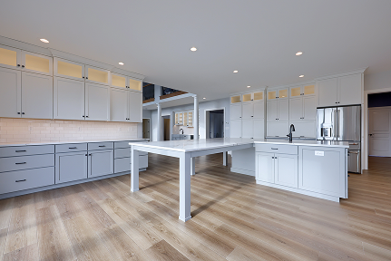 A statement kitchen island built by ISM Construction serving as a multi-functional centerpiece for meal prep, casual dining, and family gatherings.