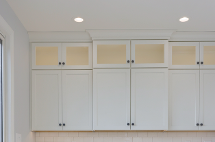 Luxury quartz and natural stone countertops with a custom backsplash installed by ISM Construction, elevating the design of a Lebanon County kitchen remodel.