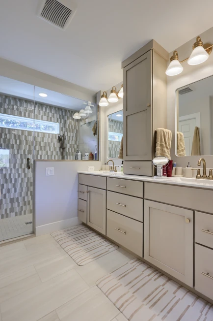 A kitchen and bathroom upgrade by ISM Construction featuring updated fixtures, fresh finishes, and an improved layout for better function and style.