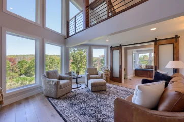 A Sunnyside Road home upgraded by ISM Construction with energy-efficient windows and a stunning new entry door enhancing beauty, security, and comfort.
